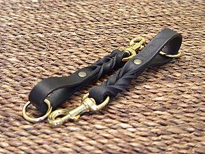 Short leather dog leash (pull tab leash) for Labrador dog